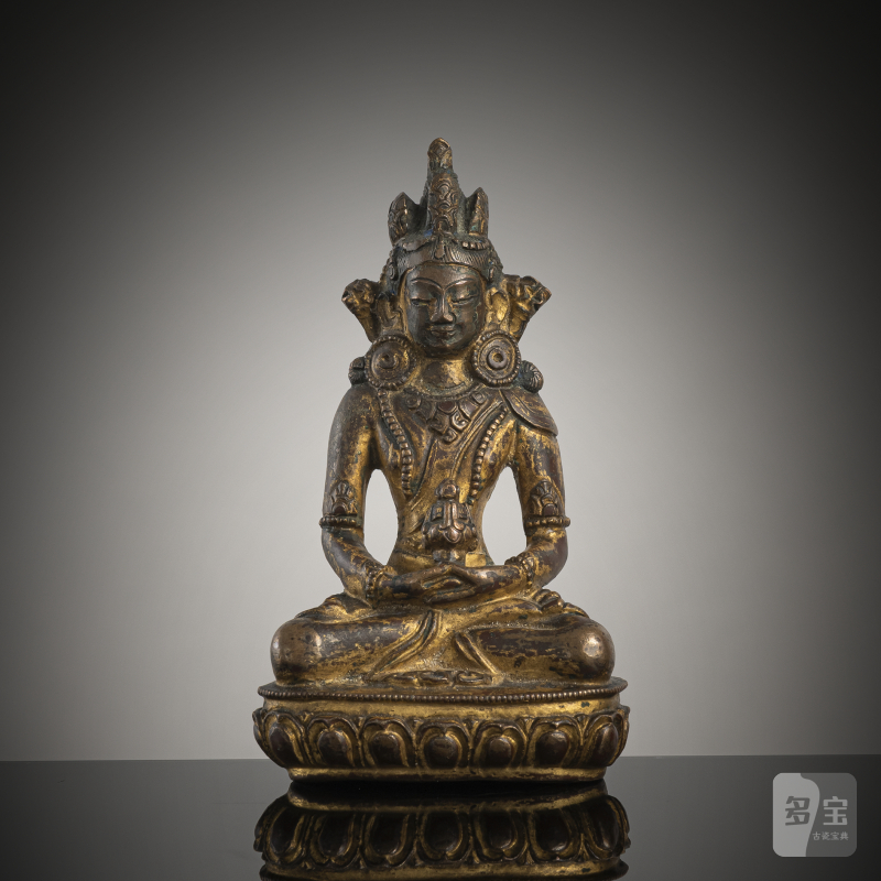 A GILT-BRONZE FIGURE OF AMITAYUS